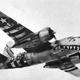 Battle-scarred B-26B Big Hairy Bird of the 599th bomber squadron, sporting a shark’s mouth and D-Day invasion stripes, flies somewhere over Europe in 1944. (US Air Force)